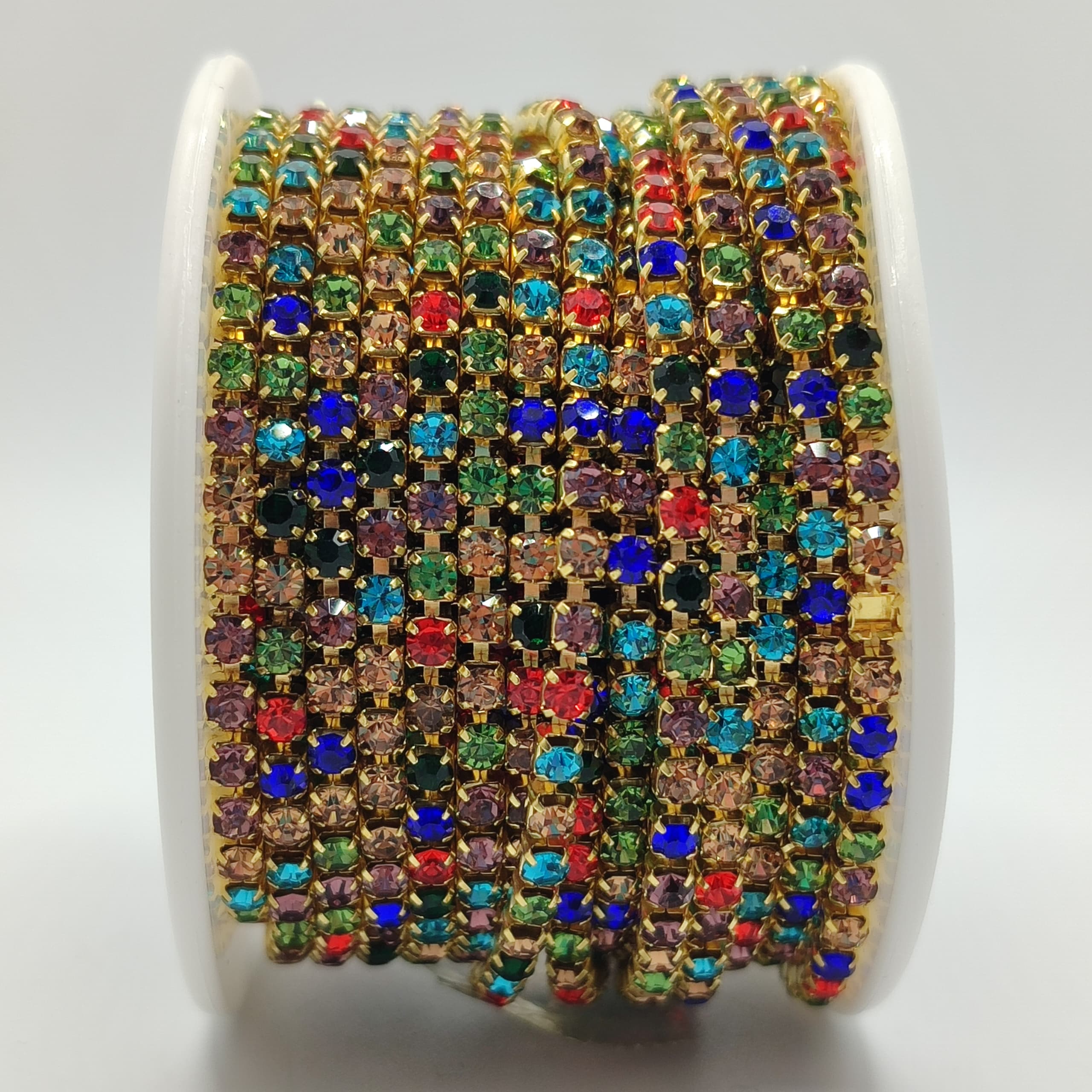 STRASS MULTICOLOR CON BASE DORADA
